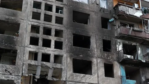 Russian terrorists dropped bombs and destroyed building,killed civilians in Kyiv Stock Footage 201693580