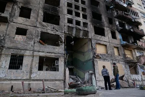 Russian terrorists dropped bombs and destroyed building,killed civilians in.. Fotos Stock