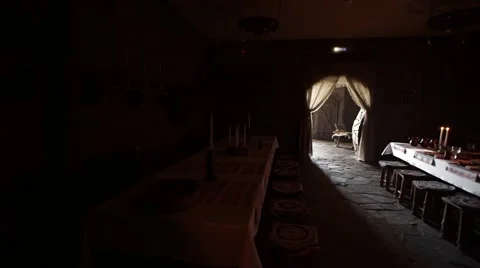 Russian tradition. Candles at dinner. Table setting. Dark room. Bright candles.  Stock Footage 64816106
