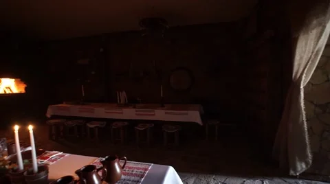 Russian tradition. Candles at dinner. Table setting. Dark room. Bright candles.  Stock Footage 64816143