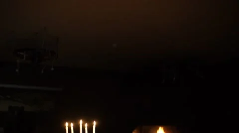 Russian tradition. Candles at dinner. Table setting. Dark room. Bright candles.  Stock Footage 64816180