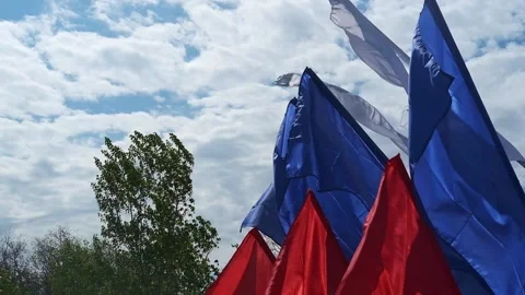 The Russian tricolor develops against the sky. Video stock 243488332