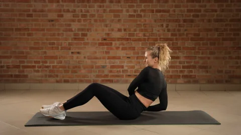 Russian Twist Exercise for Enhanced Core Agility and Strength Stock Footage 269190423