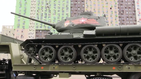 Russian War Tank T-34 and Trucks ride Moscow Urban street. Stock Footage 75409302
