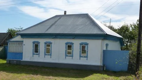 Russian whitewashed dacha on the Foundation. Stock Photos