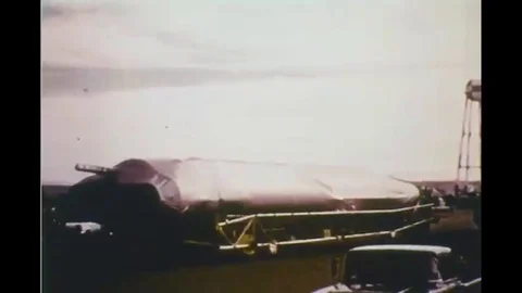 Russians launch the first satellite, the Sputnik 1 and follow it with Sputnik 2 Stock Footage 116495023
