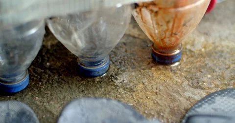 Rust and corrosion developing at the base of plastic bottles due to long-term. Stock Footage 311596009