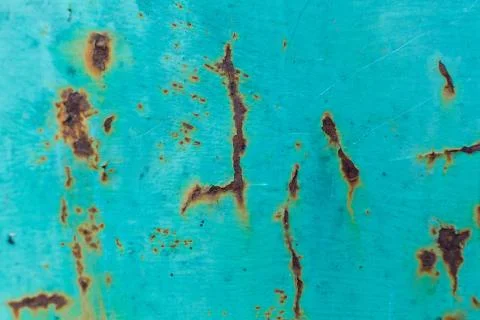 Rust appears through paint on metal doors Stock Photos