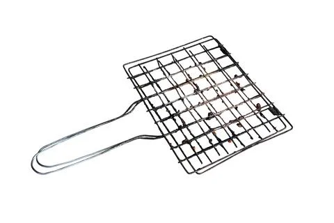 Rust colander grating grill for roast isolated on white background. Stock Photos