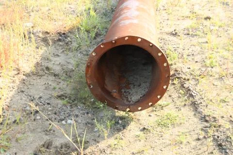 Rust colored pipe at construction area Foto stock
