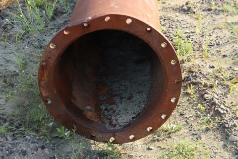 Rust colored pipe at construction area Stock Photos