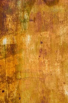 Rust covered metal with white paint traces Photos