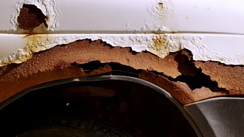 Rust destroying white car body creating a rusty and damaged texture Stock Footage 324612486