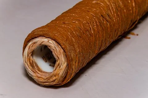 Rust dirty polypropylene drawstring cartridge mechanical cleaning water filter Stock Photos