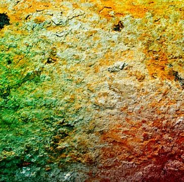 Rust grunge textured background under a layer of clay with shades of green, r Stock Photos