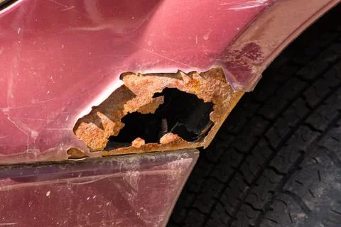 Rust hole Stock Photos