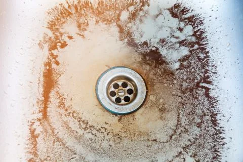 Rust in the kitchen sink Stock Photos