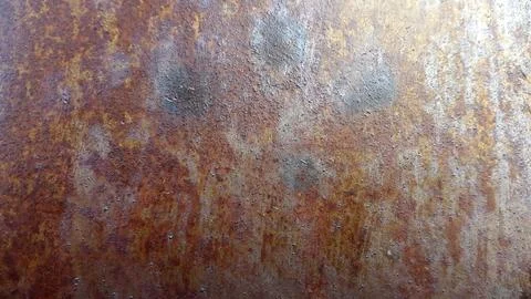 Rust on metal. Rusty metal surface. Vintage rusty background Stock Photos