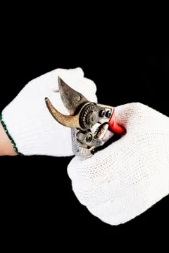 Rust metal scissors in hand Stock Photos