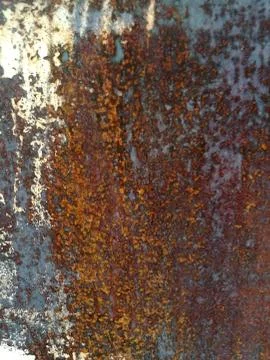 Rust on metal surface covered with paint Stock Photos
