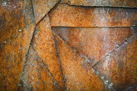 Rust metal texture background. The pieces of metal welded among themselves Stock Photos