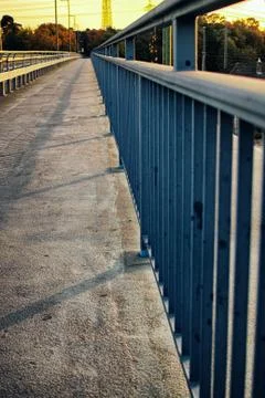 Rust railing stairs concrete Fall Protection summer light bridge Foto stock
