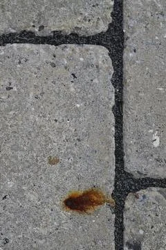 Rust Stain on Stone Pavement Stock Photos