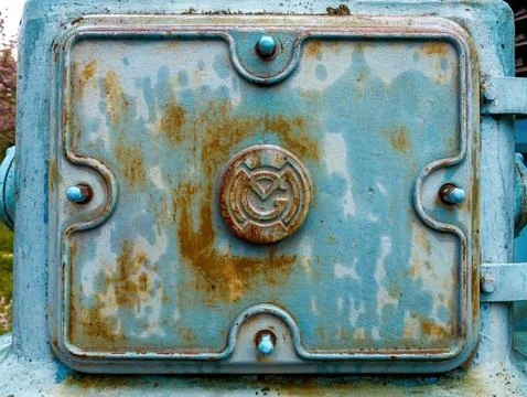 Rust-Stained Industrial Panel with Logo 스톡 사진