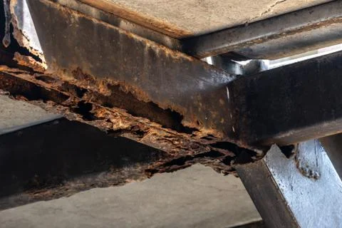 Rust on steel structural columns &amp; post floor support. Stock Photos