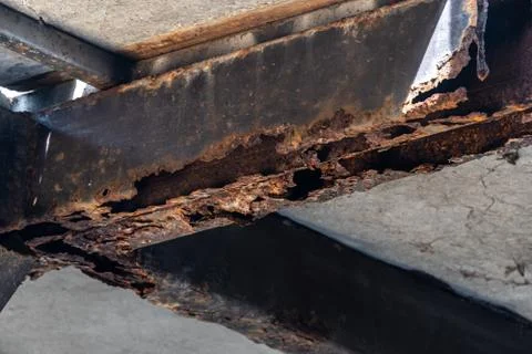 Rust on steel structural columns &amp; post floor support. Stock Photos