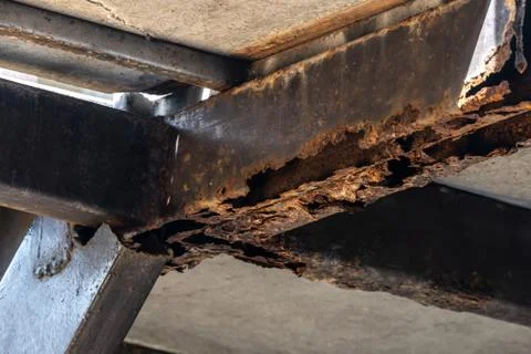 Rust on steel structural columns &amp; post floor support. Stock Photos