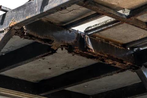 Rust on steel structural columns &amp; post floor support. Stock Photos