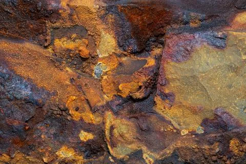 Rust stone wall stone texture image use for backgrounds or textures Stock Photos