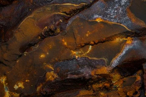 Rust stone wall stone texture image use for backgrounds or textures Stock Photos