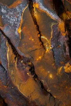Rust stone wall stone texture image use for backgrounds or textures Stock Photos