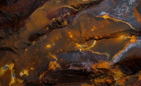 Rust stone wall stone texture image use for backgrounds or textures Stock Photos