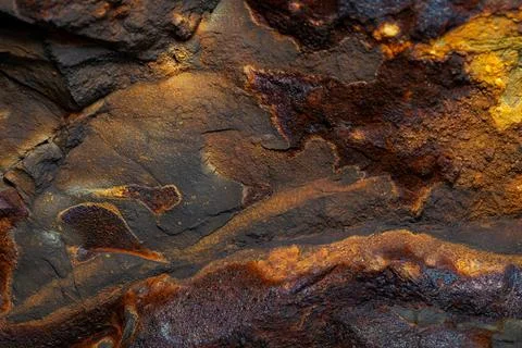 Rust stone wall stone texture image use for backgrounds or textures Stock Photos