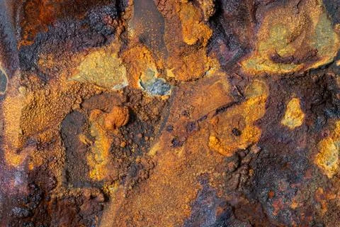 Rust stone wall stone texture image use for backgrounds or textures Stock Photos