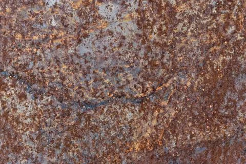Rust on surface of the old iron plate. Deterioration of the steel. Stock Photos