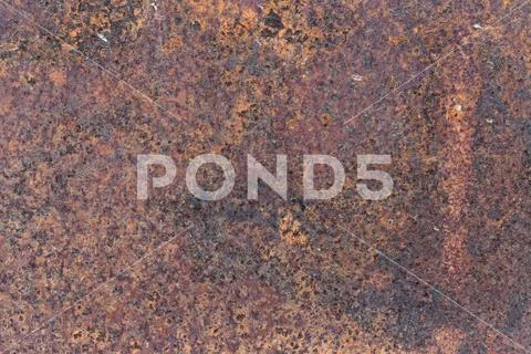 Rust on surface of the old iron plate. Deterioration of the steel. Stock Photos