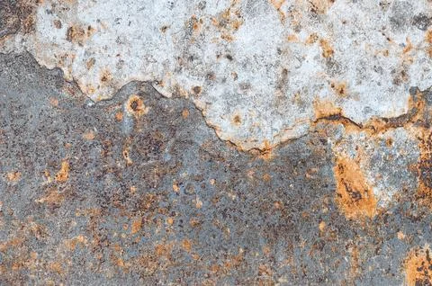 Rust texture with spots and bumps on a metal sheet. Stock Photos