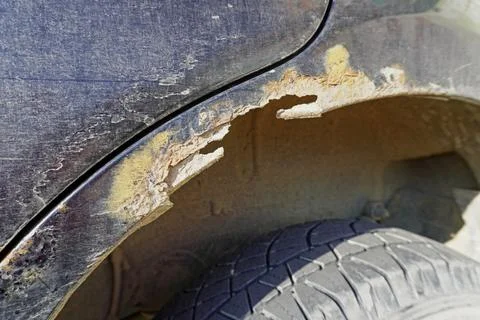 Rust on the wheel arch of the car. Foto stock