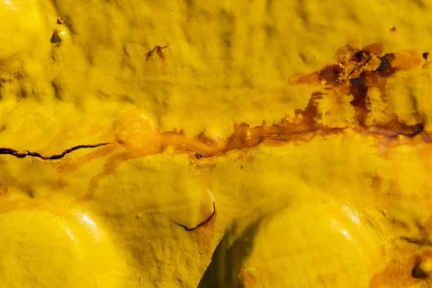 Rust on a Yellow Paint Surface 写真素材