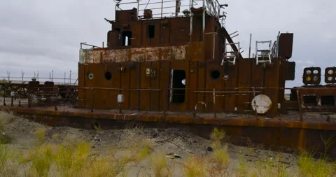Rusted Abandoned Ship Stranded in Aral Sea Desert Stock Footage 346416242