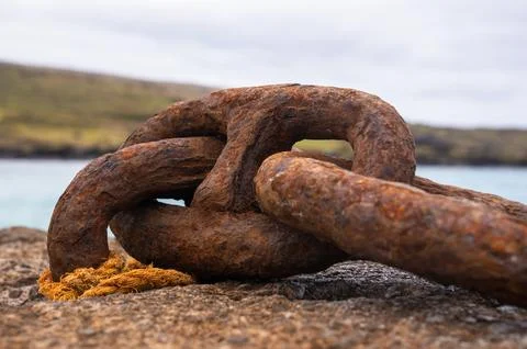 Rusted anchor chain link symbolizing strength, history, and decay Stock Photos