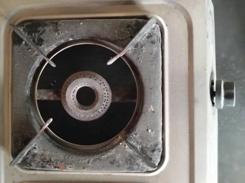 Rusted burner in the kitchen. Stock Photos