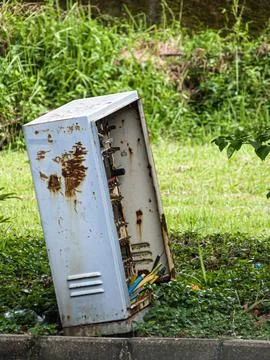 Rusted Electrical Junction Box in West Java Stock Photos