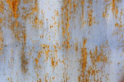 Rusted flat solid sheet metal surface background and texture with leftovers of Stock Photos