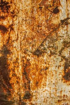 Rusted flat solid sheet metal surface background and texture with leftovers of Foto stock