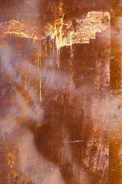 Rusted flat solid sheet metal surface background and texture with leftovers of Foto stock